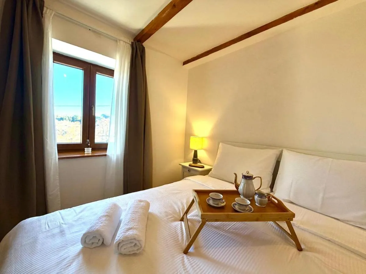 Prepared double bedroom with a countryside view