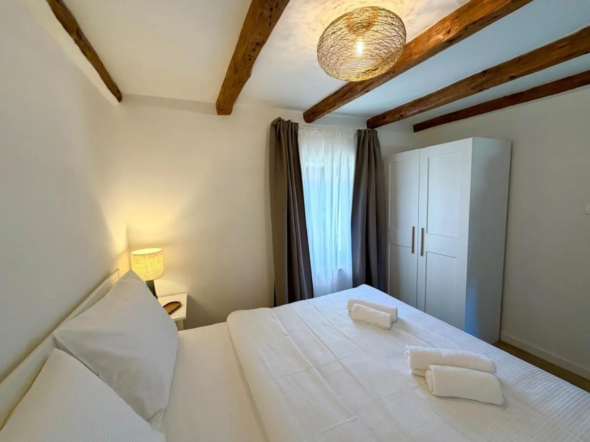 Double bedroom with wardrobe and exposed timber beams