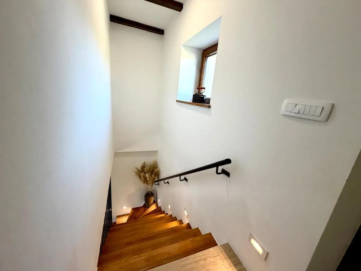 Staircase leading to the upper floor of the stone house