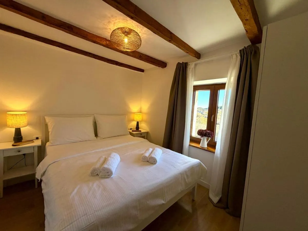 Double bedroom with original timber ceiling beams