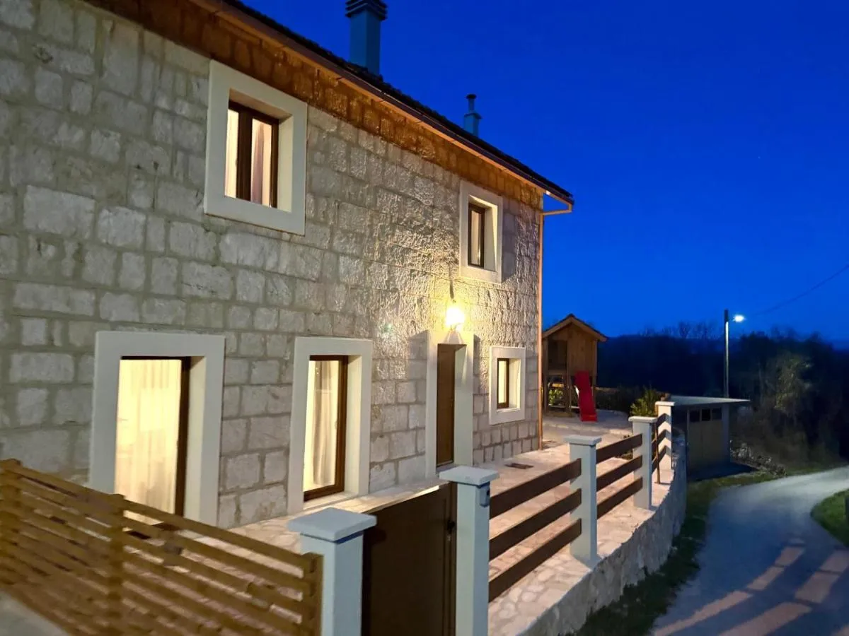 Evening view of the stone house from the private entrance