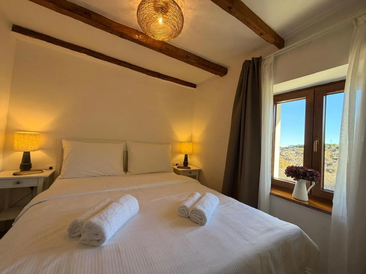 Double bedroom prepared with fresh towels