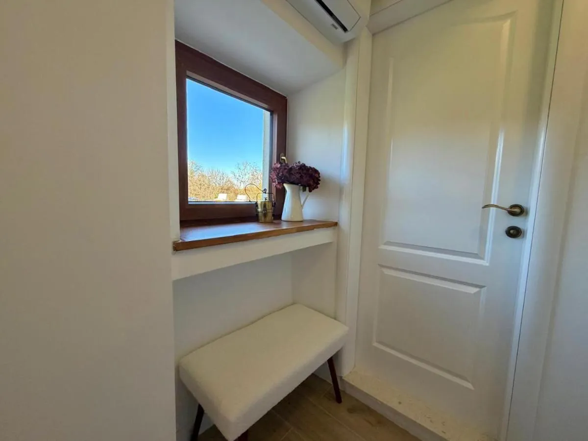 Interior entrance and window detail at Villa Billubium